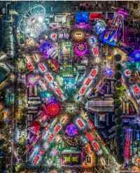 Huvipuisto yöllä - Aerial shot of the Orange County Fair at night.