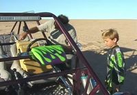 Kid does awesome sandrail wheelie